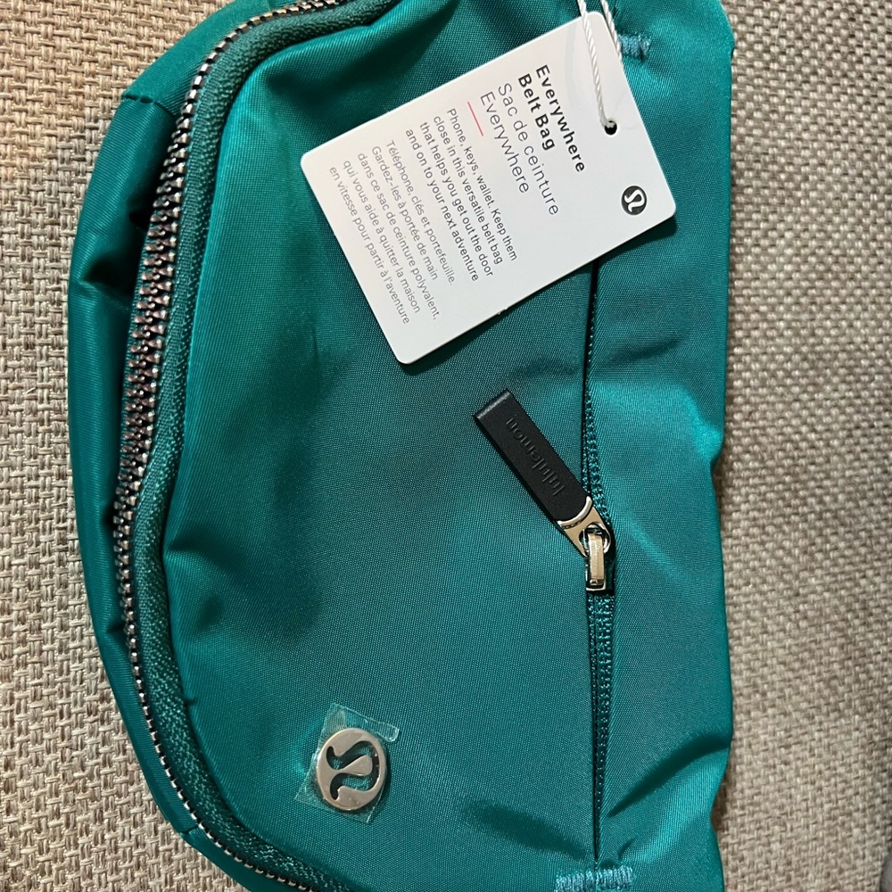 lululemon teal nylon belt bag with silver hardware